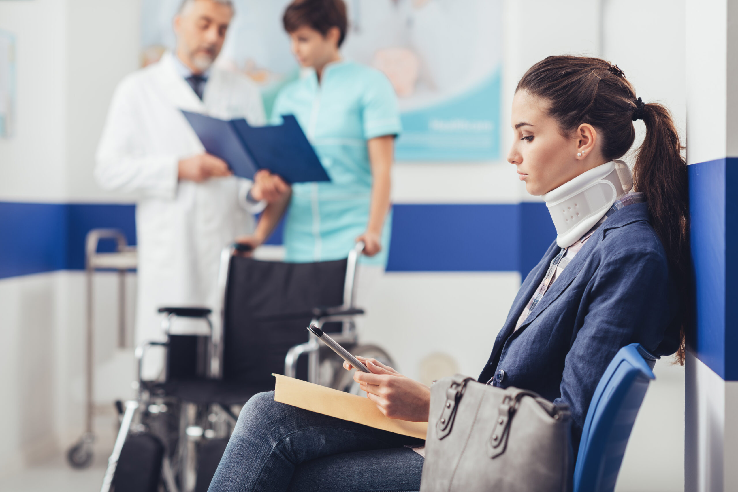 injury woman in hospital with neck brace